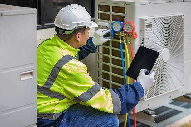 Professional Heat Pump Repair technician working in Sperry, OK